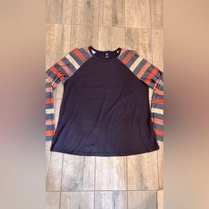 Emery Rose royal blue knit top with stripe sleeve detail.